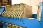 Used JWI J Press Filter Press, Model 1000N32-12/30-10/25SYLS. (12) 39.3” x 39.3” x 1/2'' recess polypropylene plates, (1) head, (1) tail plate. Approximately 206 square feet filter area, 10 cubic fee...