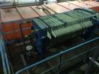 Used JWI Filter Press. 10 cubic foot, elevated stand for roll of box. Press has 800 mm plates, 23 plates plus head and tail.