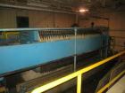 Used Perrin 1000 mm Filter Press. Press consists of 45 polypropylene filter plates. Top center feed, 4 corner discharge. 1-3/16
