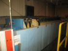 Used Perrin 1000 mm Filter Press. Press consists of 45 polypropylene filter plates. Top center feed, 4 corner discharge. 1-3/16
