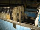 Used Perrin 1000 mm Filter Press. Press consists of 45 polypropylene filter plates. Top center feed, 4 corner discharge. 1-3/16
