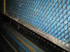 Used Perrin 1000 mm Filter Press. Press consists of 45 polypropylene filter plates. Top center feed, 4 corner discharge. 1-3/16