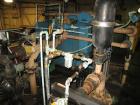 Used Perrin 1000 mm Filter Press. Press consists of 45 polypropylene filter plates. Top center feed, 4 corner discharge. 1-3/16