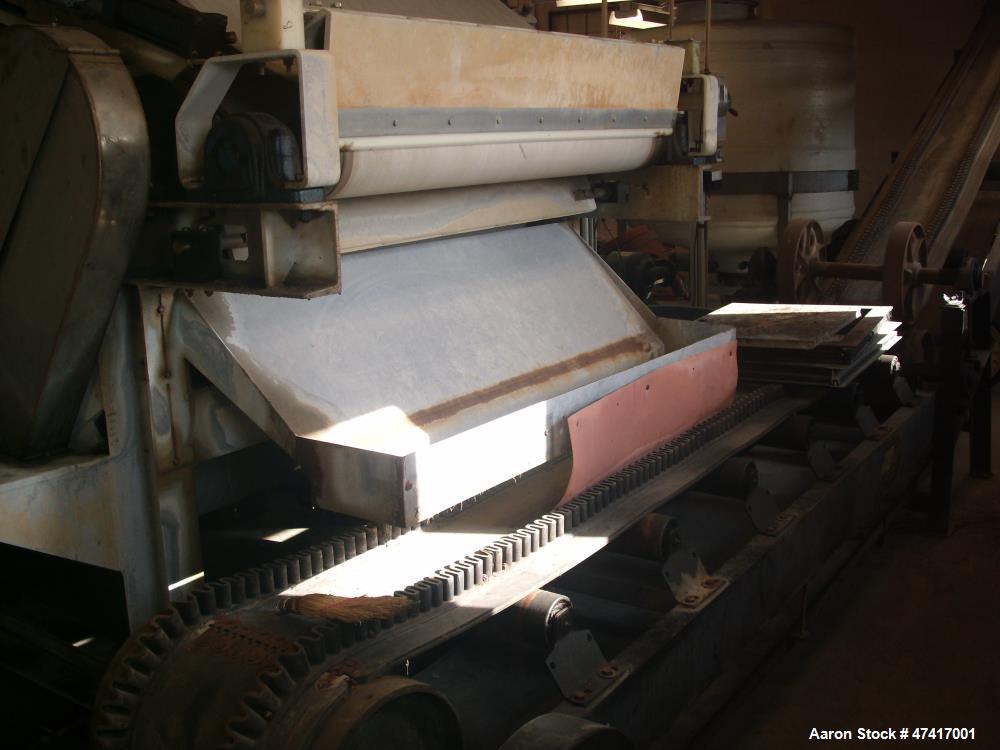 Used Ashbrook Simon Hartley Belt Filter Press. 1 Meter Belt, 0-80 gpm, MK II Klampress. Includes polymer system, conveyor, and several pumps.