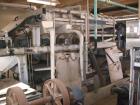 Used Ashbrook Simon Hartley Belt Filter Press. 1 Meter Belt, 0-80 gpm, MK II Klampress. Includes polymer system, conveyor, and several pumps.