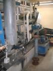 Used Ashbrook Simon Hartley Belt Filter Press. 1 Meter Belt, 0-80 gpm, MK II Klampress. Includes polymer system, conveyor, and several pumps.