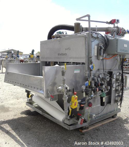 Used Oberlin Automatic Pressure Filter, Model OPF-12, Carbon Steel. 12 Square feet filter area. Approximate press area 36" x 48". End discharge. Cloth advance driven by a 1/4 hp, 3/60/230/460 volt, 1...