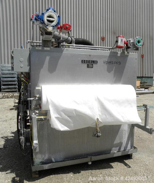 Used Oberlin Automatic Pressure Filter, Model OPF-12, Carbon Steel. 12 Square feet filter area. Approximate press area 36" x 48". End discharge. Cloth advance driven by a 1/4 hp, 3/60/230/460 volt, 1...