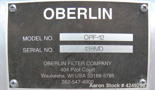 Used Oberlin Automatic Pressure Filter, Model OPF-12, Carbon Steel. 12 Square feet filter area. Approximate press area 36" x 48". End discharge. Cloth advance driven by a 1/4 hp, 3/60/230/460 volt, 1...