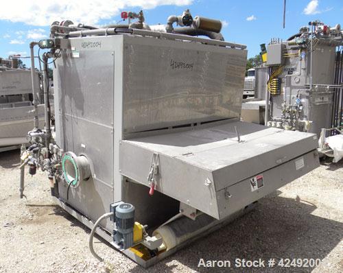 Used Oberlin Automatic Pressure Filter, Model OPF-12, Carbon Steel. 12 Square feet filter area. Approximate press area 36" x 48". End discharge. Cloth advance driven by a 1/2 hp, 3/60/230/460 volt, 1...