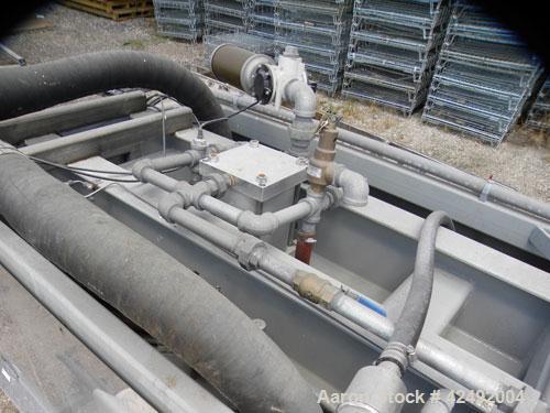 Used Oberlin Automatic Pressure Filter, Model OPF-12, Carbon Steel. 12 Square feet filter area. Approximate press area 36" x 48". End discharge. Cloth advance driven by a 1/2 hp, 3/60/230/460 volt, 1...