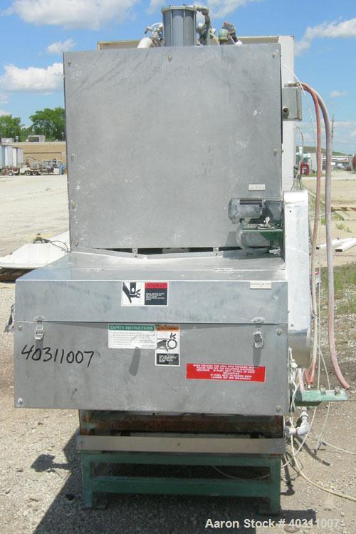Used Oberlin Automatic Pressure Filter, model OPF-4, stainless steel and carbon steel construction. 4 square feet filter area. 28'' wide x 60'' long belt. Approximate press area 25'' x 29''. Bottom d...