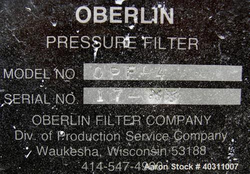 Used Oberlin Automatic Pressure Filter, model OPF-4, stainless steel and carbon steel construction. 4 square feet filter area. 28'' wide x 60'' long belt. Approximate press area 25'' x 29''. Bottom d...
