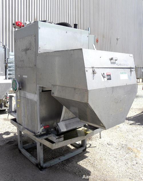 Used Oberlin Automatic Pressure Filter, Model OPF-4, Carbon Steel. 4 Square feet filter area. Approximate press area 24" x 28". End discharge. Cloth advance driven by a 1/4 hp, 3/60/230/460 volt, 114...