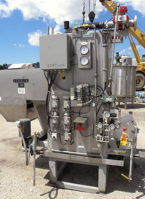 Used Oberlin Automatic Pressure Filter, Model OPF-4, Carbon Steel. 4 Square feet filter area. Approximate press area 24" x 28". End discharge. Cloth advance driven by a 1/4 hp, 3/60/230/460 volt, 114...