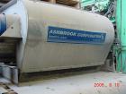 Used Ashbrook Belt Filter Press, Model KLAMPRESS 8/90. 1 Meter wide dewatering belt. Has stainless steel wetted parts and stainless steel screw conveyor. OAL 22'.