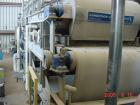 Used Ashbrook Belt Filter Press, Model KLAMPRESS 8/90. 1 Meter wide dewatering belt. Has stainless steel wetted parts and stainless steel screw conveyor. OAL 22'.