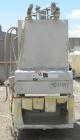 Used Oberlin Automatic Pressure Filter, model OPF-4, stainless steel and carbon steel construction. 4 square feet filter area. 28'' wide x 60'' long belt. Approximate press area 25'' x 29''. Bottom d...