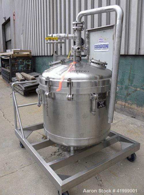 Used Chicago Boiler Company Manual Nutsche Style Filter, approximately 0.5 square meter, 316 stainless steel, vertical. 36" diameter x 24" deep, dished bolt on top with davit arm, dished bottom. Inte...