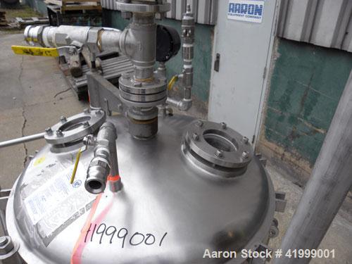 Used Chicago Boiler Company Manual Nutsche Style Filter, approximately 0.5 square meter, 316 stainless steel, vertical. 36" diameter x 24" deep, dished bolt on top with davit arm, dished bottom. Inte...