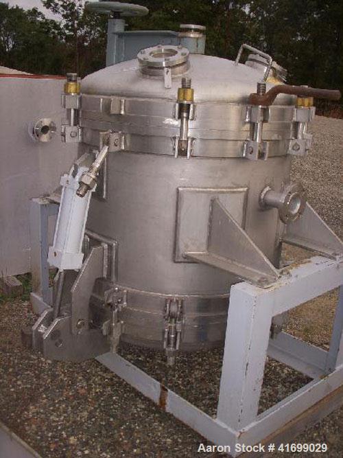 Used Durco Nutsche Style Single Leaf Pressure Filter, approximately 0.6 square meter, 316L stainless steel. 36" diameter x 28" straight side. Bolt on top with davit arm, bolt on hinged bottom with cy...