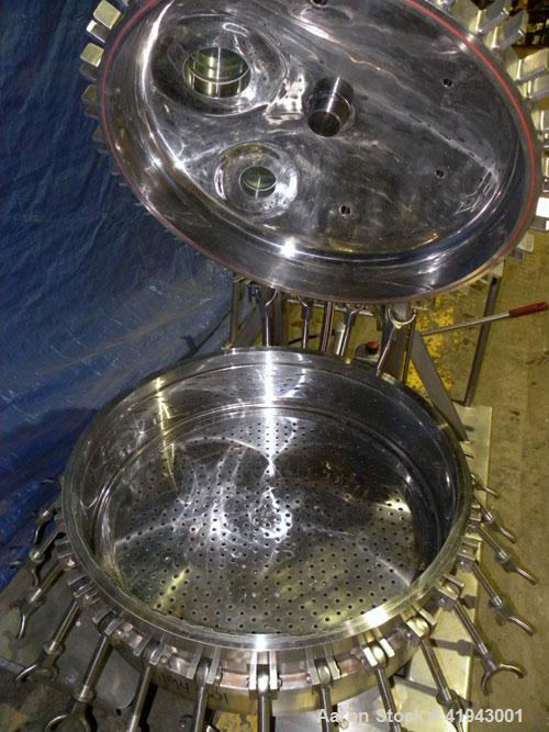 Used Northland Stainless Pressure Nutsche Filter, 0.6 square meter, Hastelloy C276. 36" diameter x 8" straight side, bolt on removable top, dish bottom. Internal rated FV/150 psi at 350 deg F and -20...