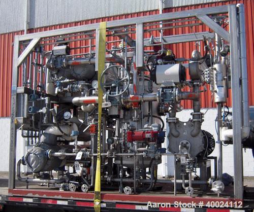 Used Rosenmund Filter Dryer, 6 square meter, Hastelloy C22. 109 3/4" diameter x 36" deep, dished top, flat bottom. Internal rated 100/FV at 302 deg F, jacket rated 100/FV at 302 deg F. (3) blade agit...