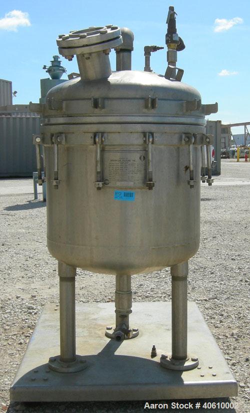 Used Sparkler manual Nutsche filter, model 24", 316 stainless steel. Vessel 24" diameter x 19" deep, dished clamp on top, dished bottom, rated 60 psi at 350 deg F. Removable inner chamber with bottom...