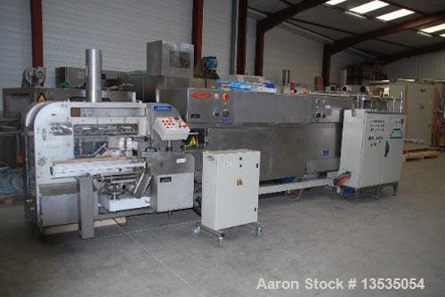Used Tournaire Pilote 300 L Stirred Extractor / Filter.  Maximum capacity 300 liters, filter diameter 680 mm, tilting bottom, hydraulic motor, lifting system, steel heat exchanger, control panel incl...