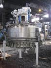 Used 2.6 sq meter ZWAG agitated nutsche filter, stainless steel construction, 1800 liter capacity vessel, rated 2 bar at 100 C internal, jacketed for 6 bar at 100 C, hydraulically operated agitator a...