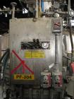 Used 2.6 sq meter ZWAG agitated nutsche filter, stainless steel construction, 1800 liter capacity vessel, rated 2 bar at 100 C internal, jacketed for 6 bar at 100 C, hydraulically operated agitator a...