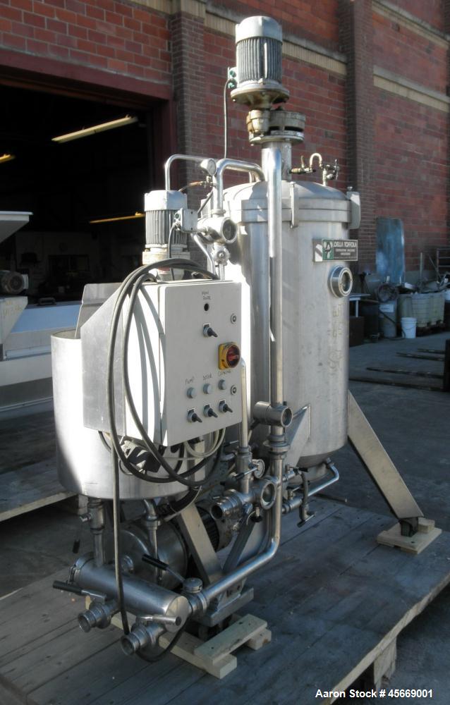 Used Della Toffola 5 square meter DE filter, stainless steel construction, automatically discharged filter. Includes 24" diameter x 40" high vertical tank with rotating horizontal leaves, precoat mix...
