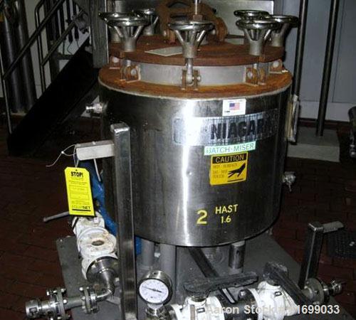 Used Ketema Niagara Horizontal Batch-Miser Plate Filter, Hastelloy C276, model 18-8D-SJ. 14.3 square feet filter area, 1.9 cubic feet cake capacity. Vertical tank, internal rated 75 psi at 320 deg F,...