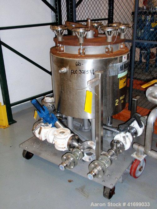 Used Ketema Niagara Horizontal Batch-Miser Plate Filter, Hastelloy C276, model 18-8D-SJ. 14.3 square feet filter area, 1.9 cubic feet cake capacity. Vertical tank, internal rated 75 psi at 320 deg F,...