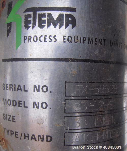 Used Ketema Niagara Batch-Miser Horizontal Plate Filter, model 33-12-S, 316 stainless steel. 74.44 square feet filter area, 5.43 cubic feet cake capacity. Vertical carbon steel lined tank with 316 st...