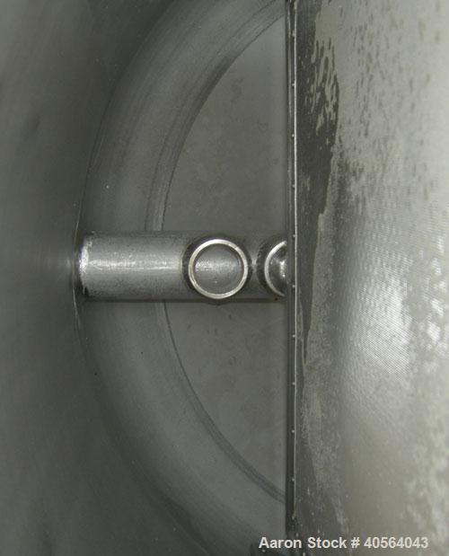 Used General Filtration Vertical Leaf Pressure Filter, 304 stainless steel. Horizontal tank 30" diameter x 36" long, dished ends, (1) hinged, rated 75 psi at 200 deg.f..(8) 18 3/4" tall x 37" long x ...