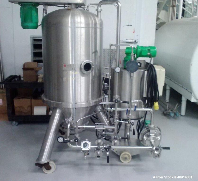 Used Padovan Pressure Leaf Filter, Model G9. Sanitary stainless steel, 8.60 square meter (90 square feet) centrifugal dry cake discharge vertical tank, horizontal leaf pack design with a 3 kW top dri...