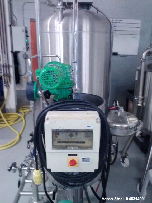 Used Padovan Pressure Leaf Filter, Model G9. Sanitary stainless steel, 8.60 square meter (90 square feet) centrifugal dry cake discharge vertical tank, horizontal leaf pack design with a 3 kW top dri...