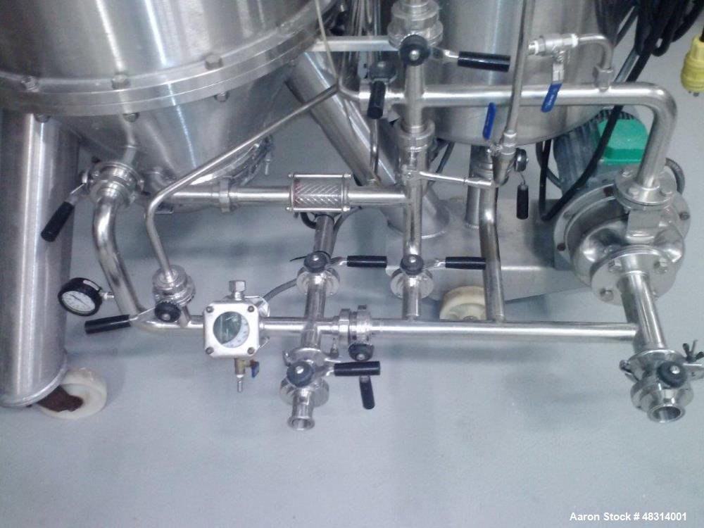 Used Padovan Pressure Leaf Filter, Model G9. Sanitary stainless steel, 8.60 square meter (90 square feet) centrifugal dry cake discharge vertical tank, horizontal leaf pack design with a 3 kW top dri...