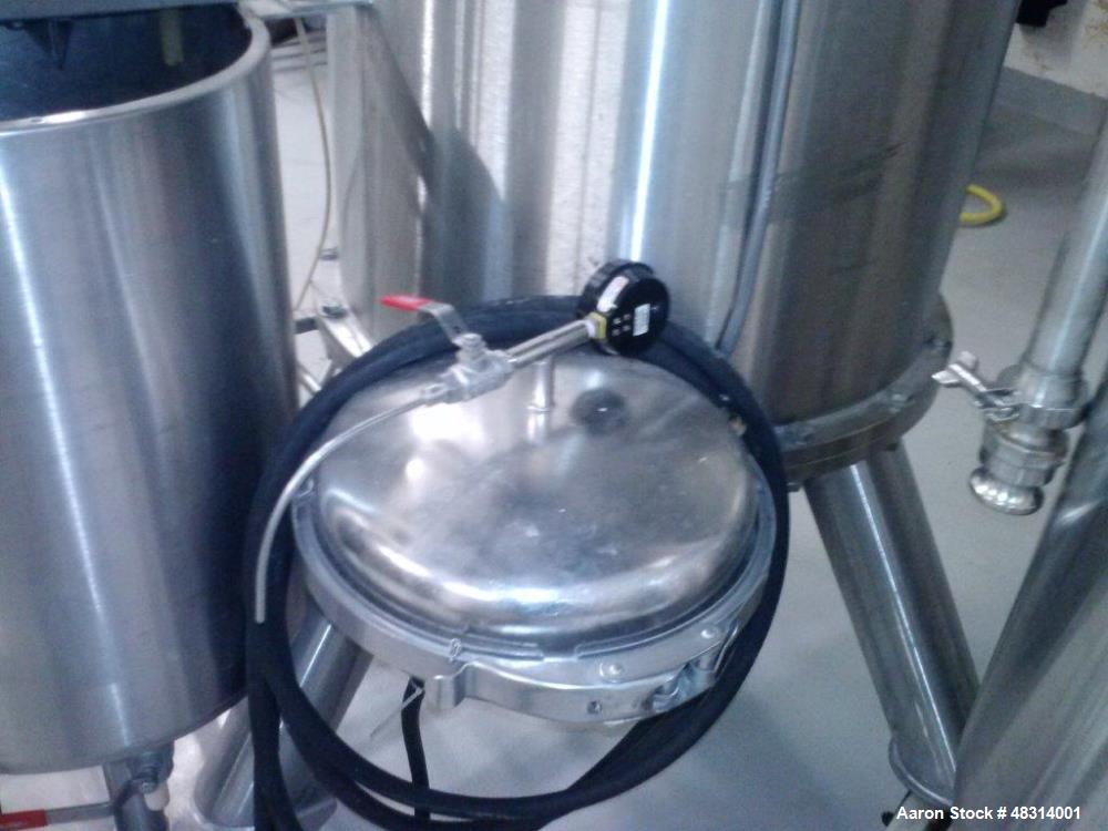 Used Padovan Pressure Leaf Filter, Model G9. Sanitary stainless steel, 8.60 square meter (90 square feet) centrifugal dry cake discharge vertical tank, horizontal leaf pack design with a 3 kW top dri...