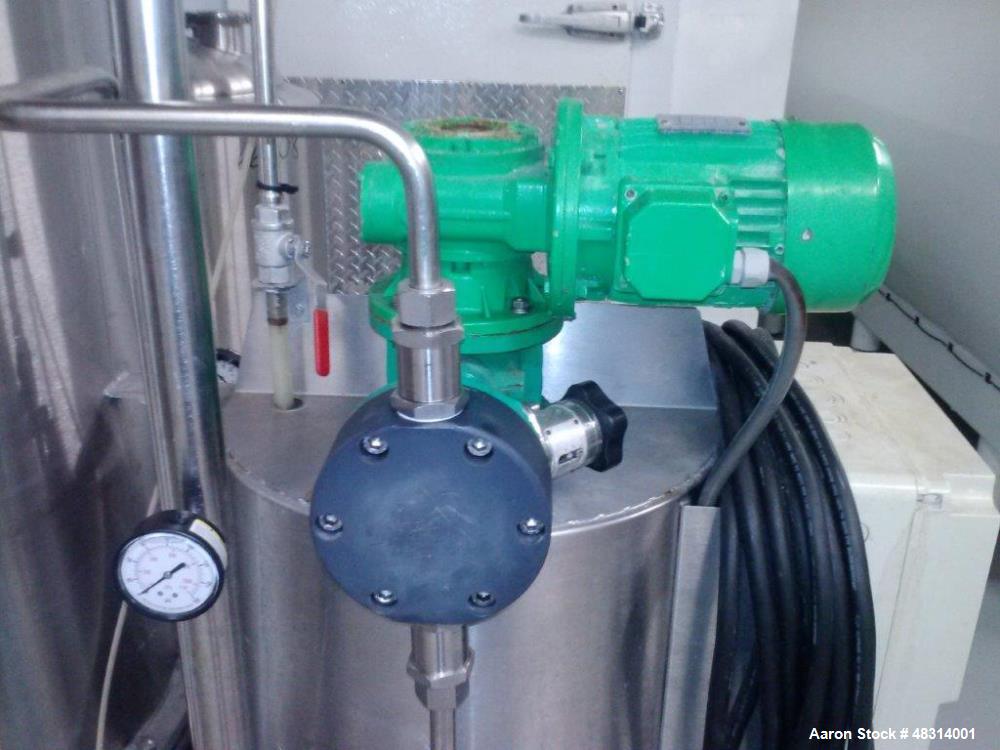 Used Padovan Pressure Leaf Filter, Model G9. Sanitary stainless steel, 8.60 square meter (90 square feet) centrifugal dry cake discharge vertical tank, horizontal leaf pack design with a 3 kW top dri...