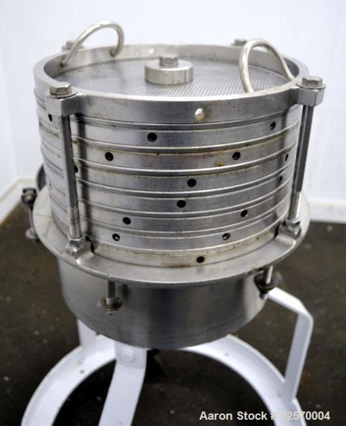 Used Sparkler Filter Horizontal Plate Filter, Model 14-7, 304 Stainless Steel. 6.23 Square feet filter area, 0.229 cubic feet cake capacity. Vertical non-jacketed tank 16" diameter x 8" deep. Bolt-on...