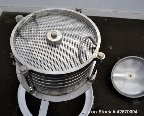 Used Sparkler Filter Horizontal Plate Filter, Model 14-7, 304 Stainless Steel. 6.23 Square feet filter area, 0.229 cubic feet cake capacity. Vertical non-jacketed tank 16" diameter x 8" deep. Bolt-on...