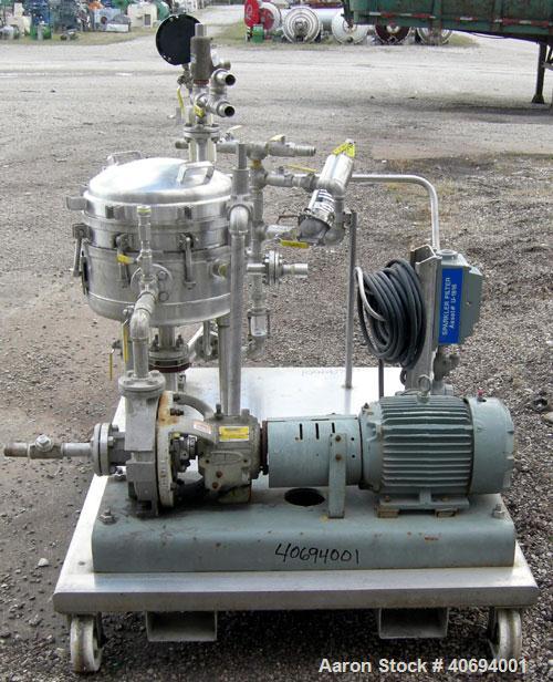 Used Sparkler Horizontal Plate Filter, model 14-D-4, 316 stainless steel. Approximate 3.2 square feet filter area, .38 cubic feet cake capacity, 220 gallons per hour. Vertical jacketed tank 16" diame...