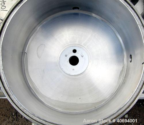 Used Sparkler Horizontal Plate Filter, model 14-D-4, 316 stainless steel. Approximate 3.2 square feet filter area, .38 cubic feet cake capacity, 220 gallons per hour. Vertical jacketed tank 16" diame...