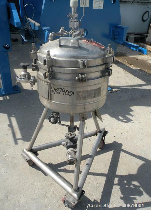Used Sparkler Horizontal Plate Filter, Model 14-D-4, 316 stainless steel. Approximate 3.52 square feet filter area, .445 cubic feet cake capacity, 220 gallons per hour. Vertical jacketed tank 16" dia...