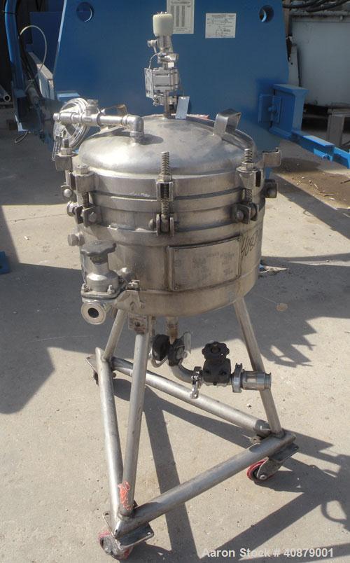 Used Sparkler Horizontal Plate Filter, Model 14-D-4, 316 stainless steel. Approximate 3.52 square feet filter area, .445 cubic feet cake capacity, 220 gallons per hour. Vertical jacketed tank 16" dia...