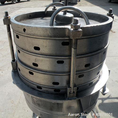 Used Sparkler Horizontal Plate Filter, Model 14-D-4, 316 stainless steel. Approximate 3.52 square feet filter area, .445 cubic feet cake capacity, 220 gallons per hour. Vertical jacketed tank 16" dia...