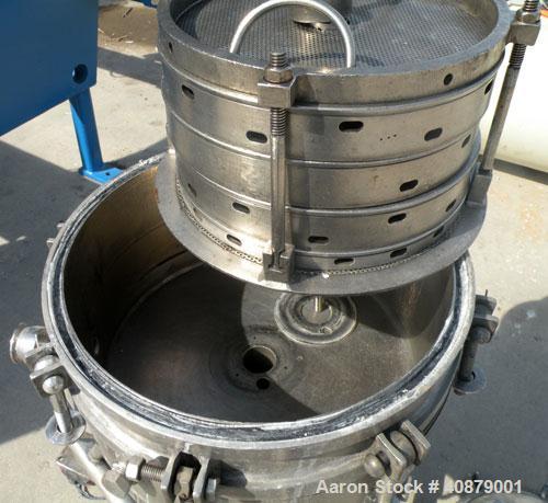 Used Sparkler Horizontal Plate Filter, Model 14-D-4, 316 stainless steel. Approximate 3.52 square feet filter area, .445 cubic feet cake capacity, 220 gallons per hour. Vertical jacketed tank 16" dia...