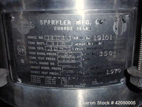 Used Sparkler Horizontal Plate Filter, model 14-D-4, 316 stainless steel. Approximately 3.52 square feet filter area, .445 cubic feet cake capacity, 220 gallons per hour. Vertical non-jacketed tank 1...